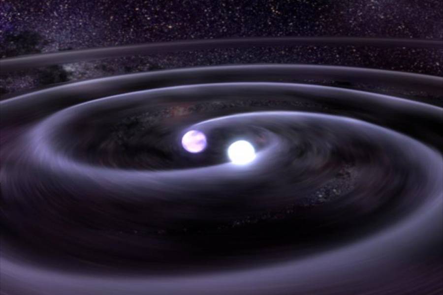 Las estrellas de un sistema binario se acercan por la emisión de ondas gravitatorias