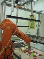 Un robot confecciona mosaicos cerámicos