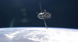 Reproducción artística de la nave especial SOYUZ aproximándose a la Estación Espacial Internacional 