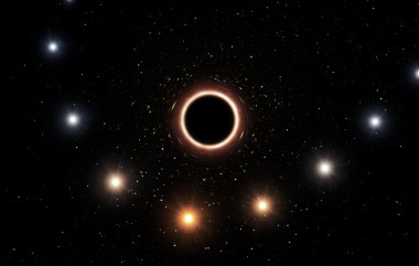 <p>Ilustración de la trayectoria de la estrella S2 a medida que se acerca al agujero negro supermasivo del centro de la Vía Láctea. Cuando está muy cerca del agujero negro, el fuerte campo gravitatorio hace que el color de la estrella se desplace ligeramente hacia el rojo, un efecto de la teoría de la relatividad general de Einstein. El gráfico se han exagerado tanto el efecto del color como el tamaño de los objetos para mayor claridad. / ESO/M. Kornmesser</p>