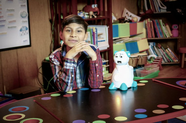 <p>Juan and the Aisoy robot in a current image / Courtesy of Lisa Armstrong</p>